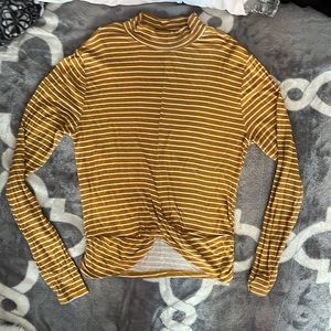 Yellow and white striped shirt. Soft material.